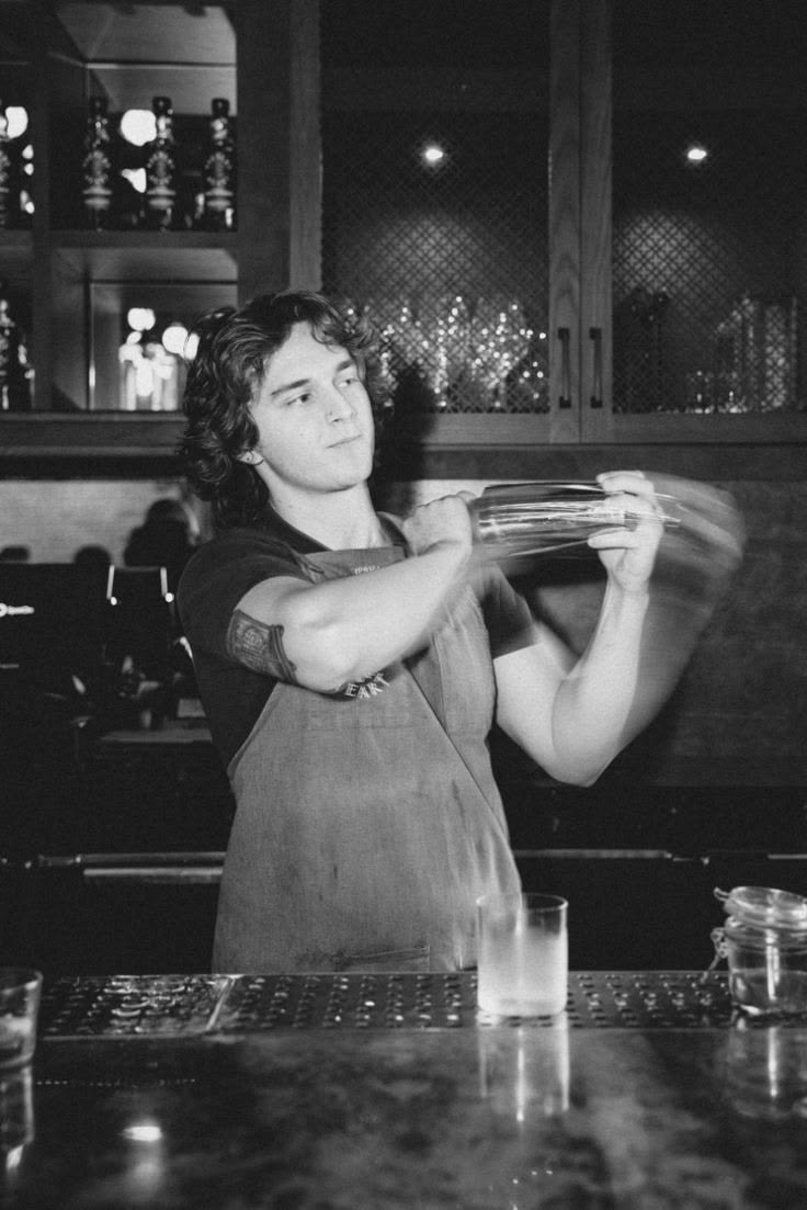 Bartender shaking a cocktail shaker